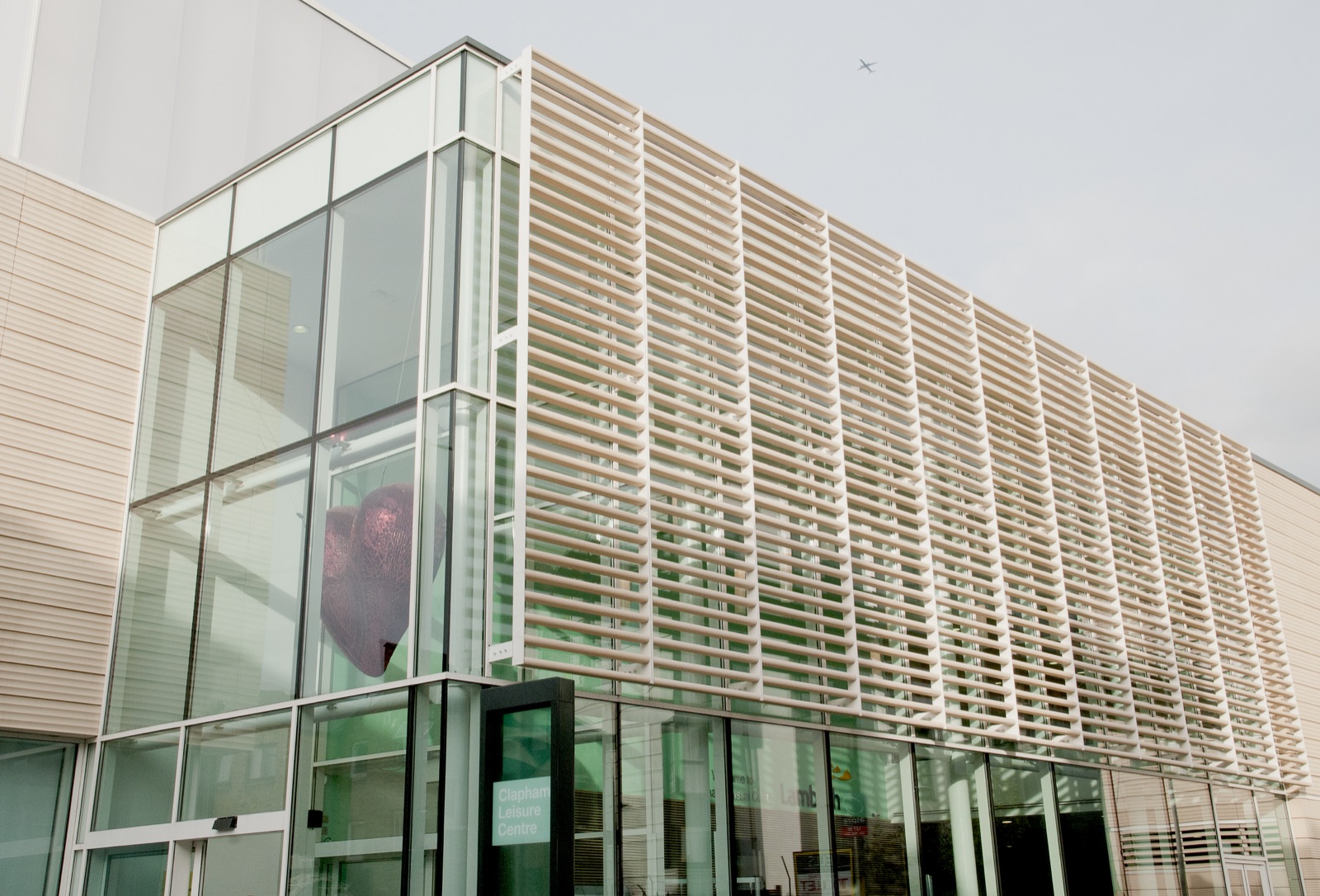 Curtain walling with vertical solar shading fins